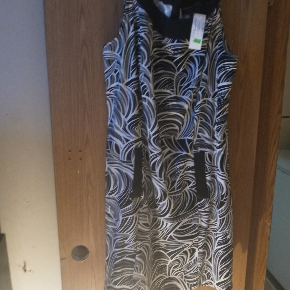 Animal print sleeveless dress with pockets